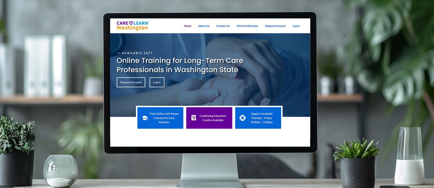 CareLearn WA homepage open on a desktop computer, ready for caregivers to explore online training.