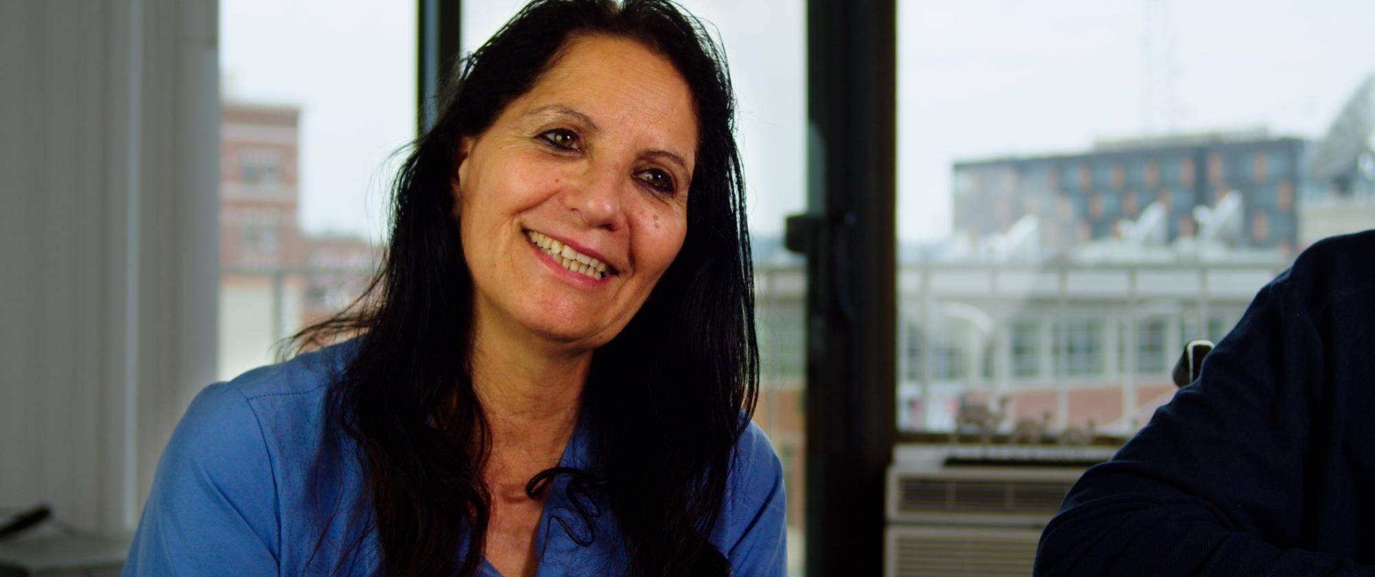 Protrait of Namaati smiling.